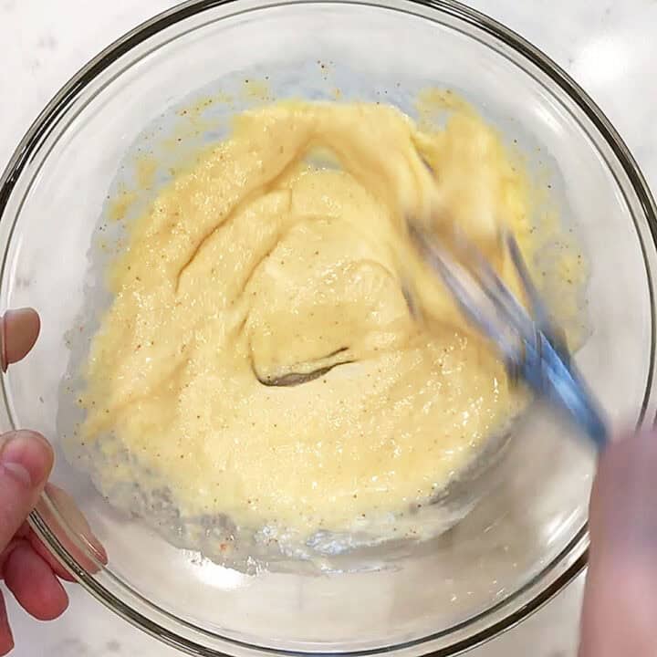 Mixing the liquid ingredients in a bowl.