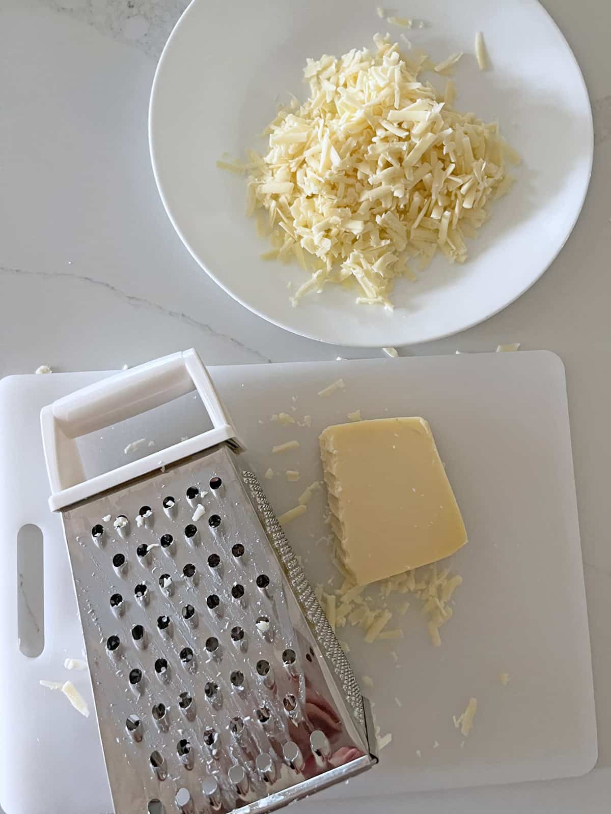 Shredded Gruyere cheese.