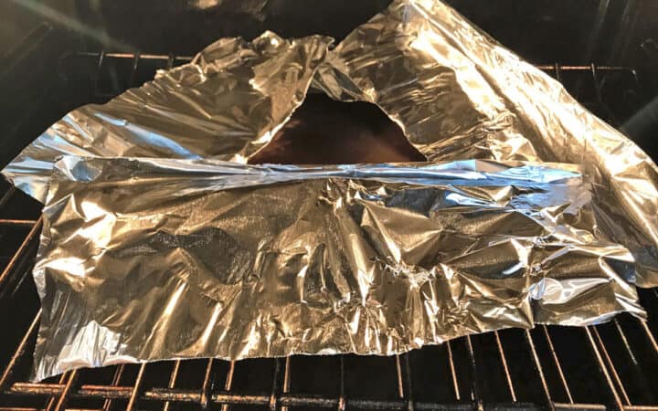 Tenting the pie with foil.