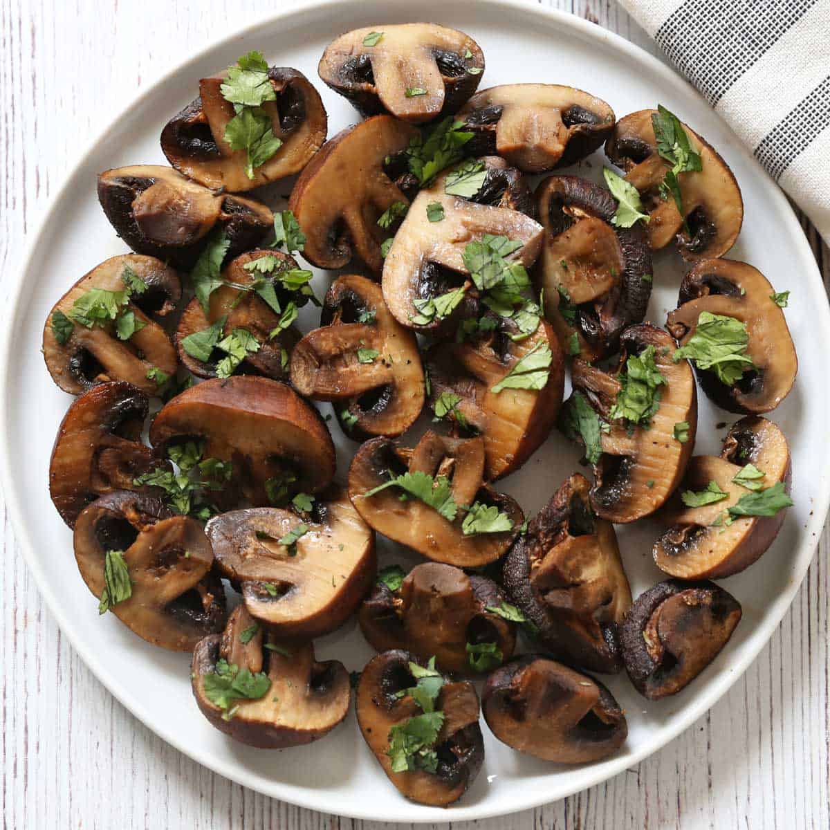 Roasted mushrooms without butter on a plate.