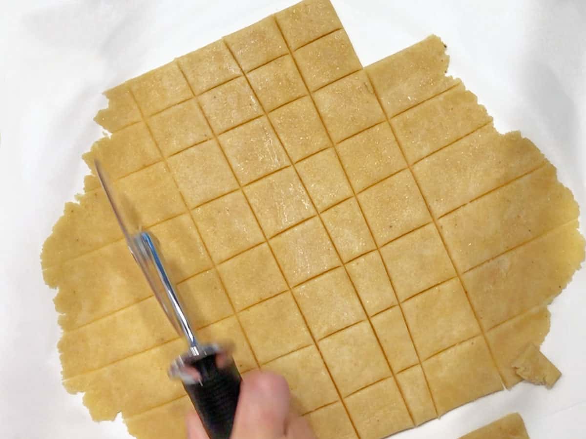 Cutting the dough.