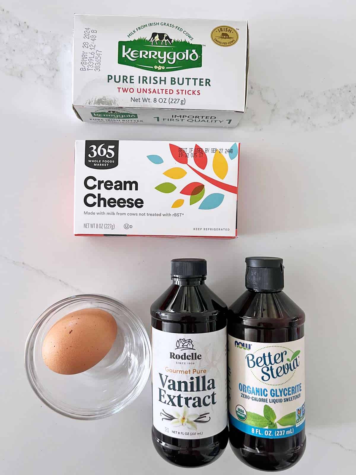 The ingredients needed to make keto mini cheesecakes.