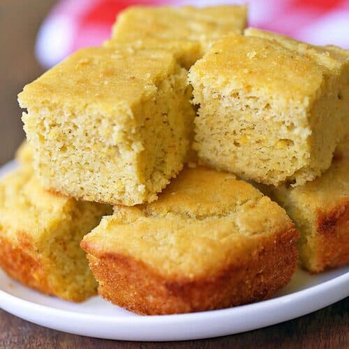 Keto cornbread is served on a white plate.