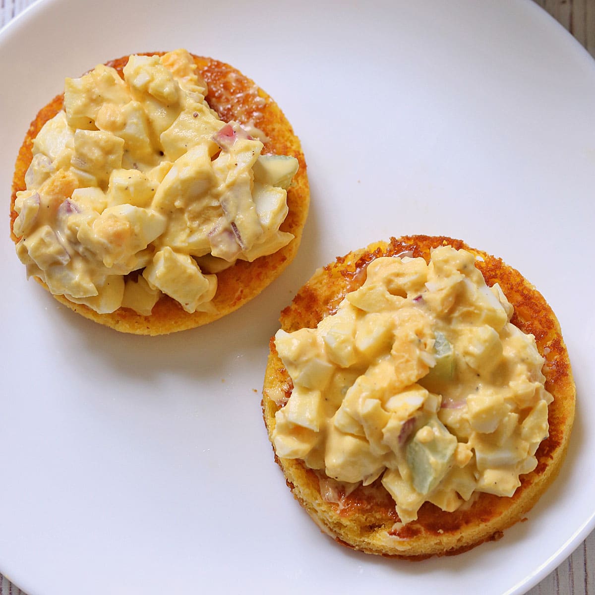 90 second bread is topped with egg salad.