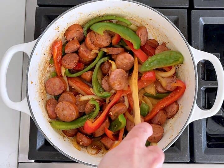 The sausage was added back to the saucepan.