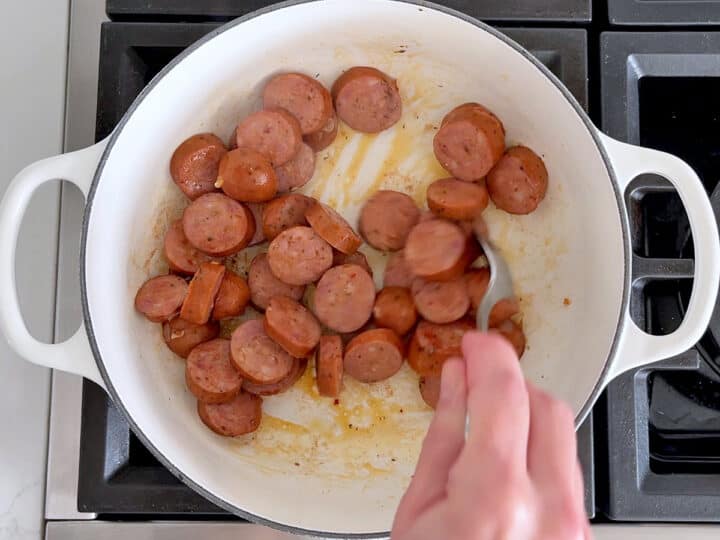 Browning the sausage.