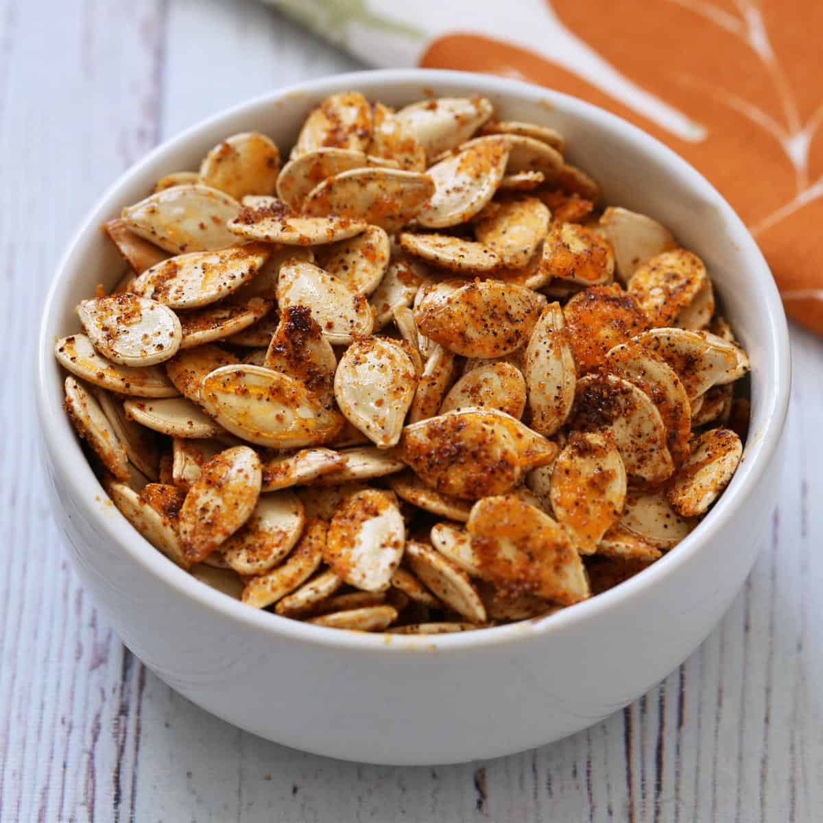Roasted pumpkin seeds that were seasoned with chili powder.