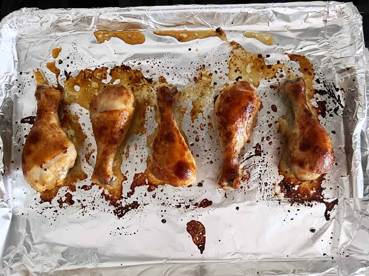 The chicken is ready in the pan.