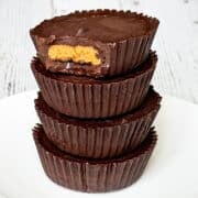 A stack of keto peanut butter cups on a plate.