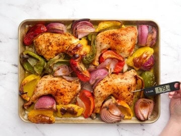 Testing the chicken's internal temperature.