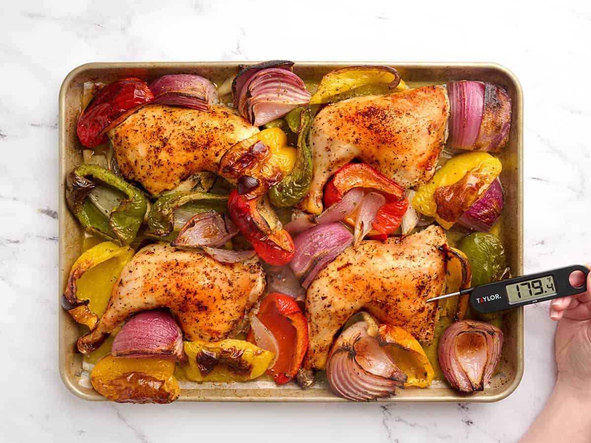 Testing the chicken's internal temperature.