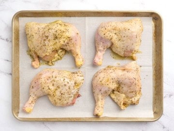 The chicken was placed on the baking sheet.