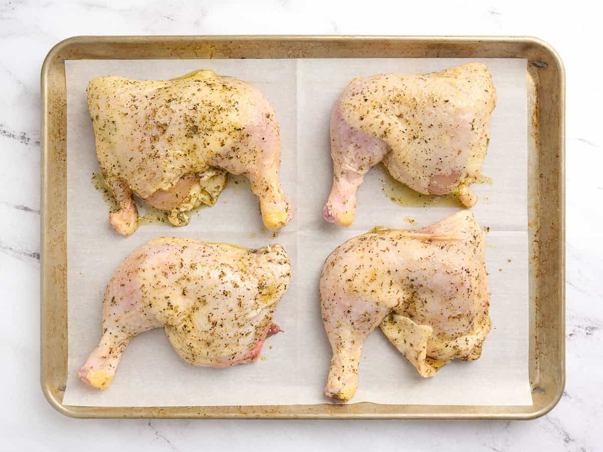 The chicken was placed on the baking sheet.