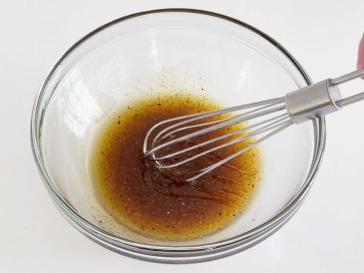 Mixing the marinade in a bowl.