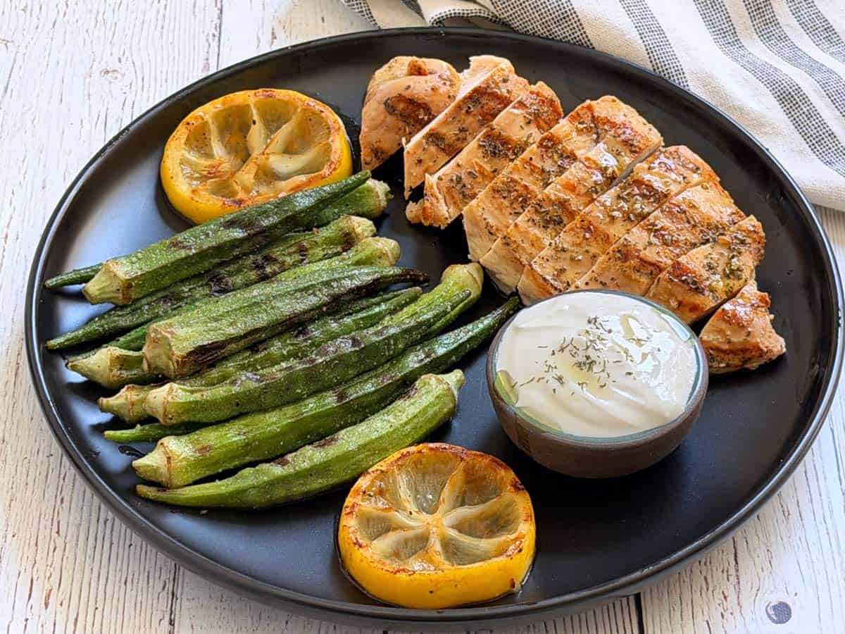Greek chicken is served with okra.